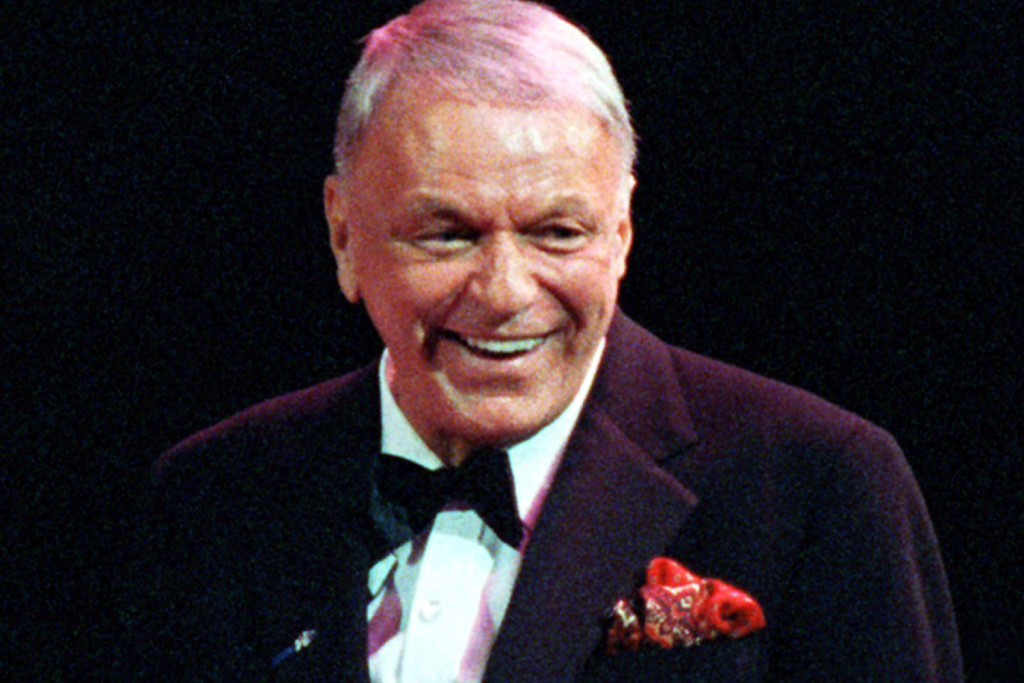 ** ADVANCE FOR SUNDAY, MAY 4 ** FILE ** This is a Dec. 13, 1990 file photo of Frank Sinatra during a concert on his 75th birthday at the Meadowlands Area in East Rutherford, N.J., Sinatra of Hoboken, N.J., is among 15 famous New Jerseyans selected as the first inductees to the New Jersey Hall of Fame.(AP Photo/Bill Kostroun, File)